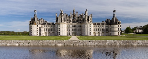 Rooftop details of Château de Chambord with chimneys and turrets