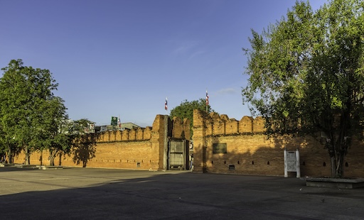 City gate and moat of Chiang Mai Old City at sunset