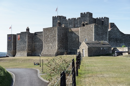 Medieval interior of Dover Castle, complete with stone walls and torches
