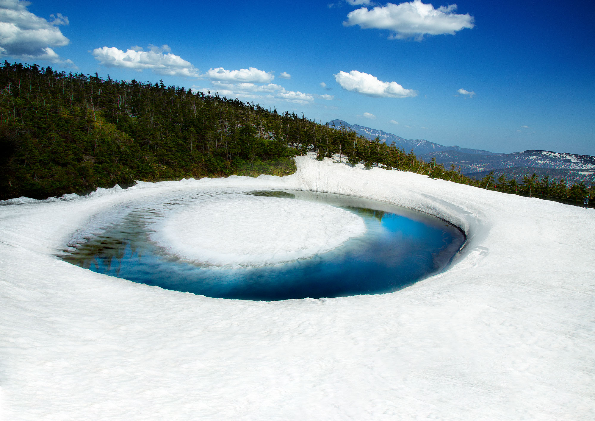 Lake Mashu during spring ice melt