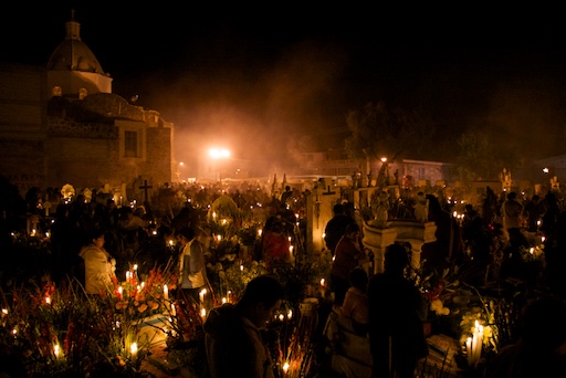 Graveyard lit with candles in Mixquic during Day of the Dead