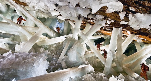 Scientist in cooling suit exploring Naica’s giant selenite crystals