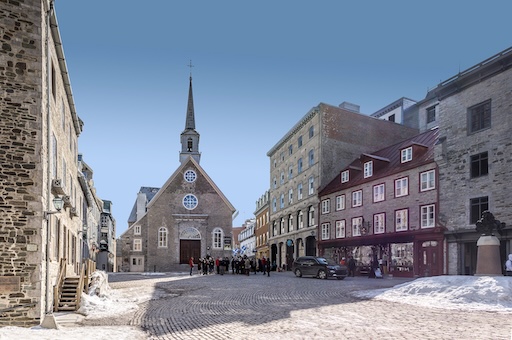 Historic square of Place Royale in Old Quebec with colorful stone houses