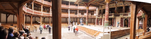 Interior of The Globe Theatre with circular wooden gallery and open-air stage