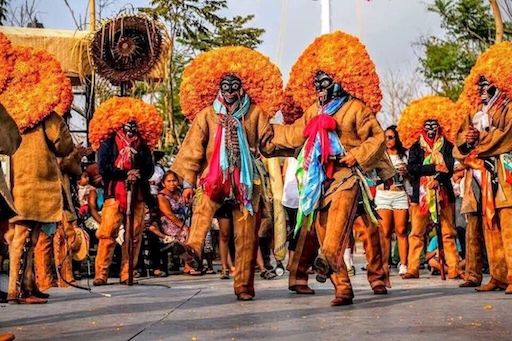 Tlacololeros dancers in jaguar masks