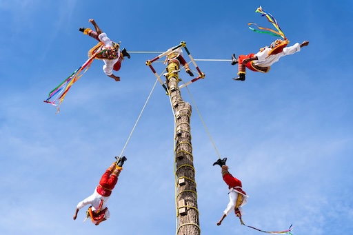 Voladores climbing the pole