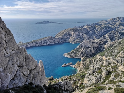 Dramatic limestone cliffs and turquoise bay in Calanques National Park