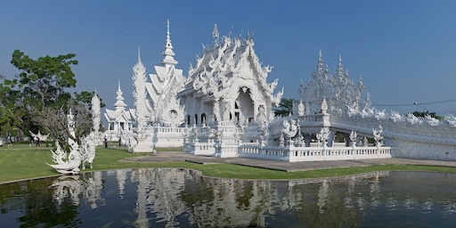 Creepy hands reaching up from below the bridge at White Temple