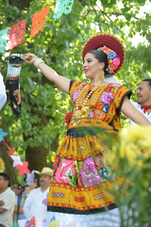 Zapotec women dancing with baskets at Guelaguetza